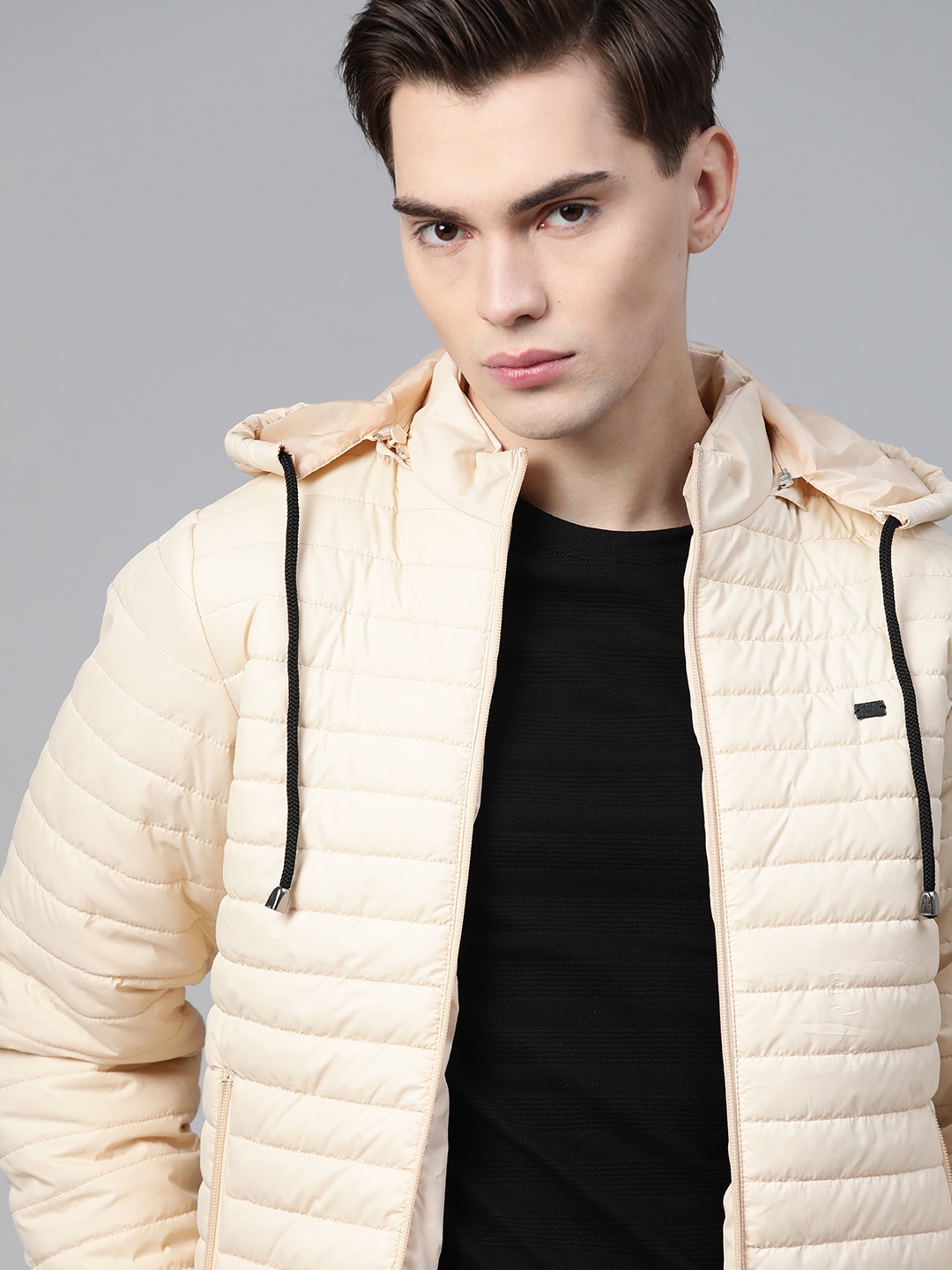 

Roadster Men Beige Solid Hooded Padded Jacket