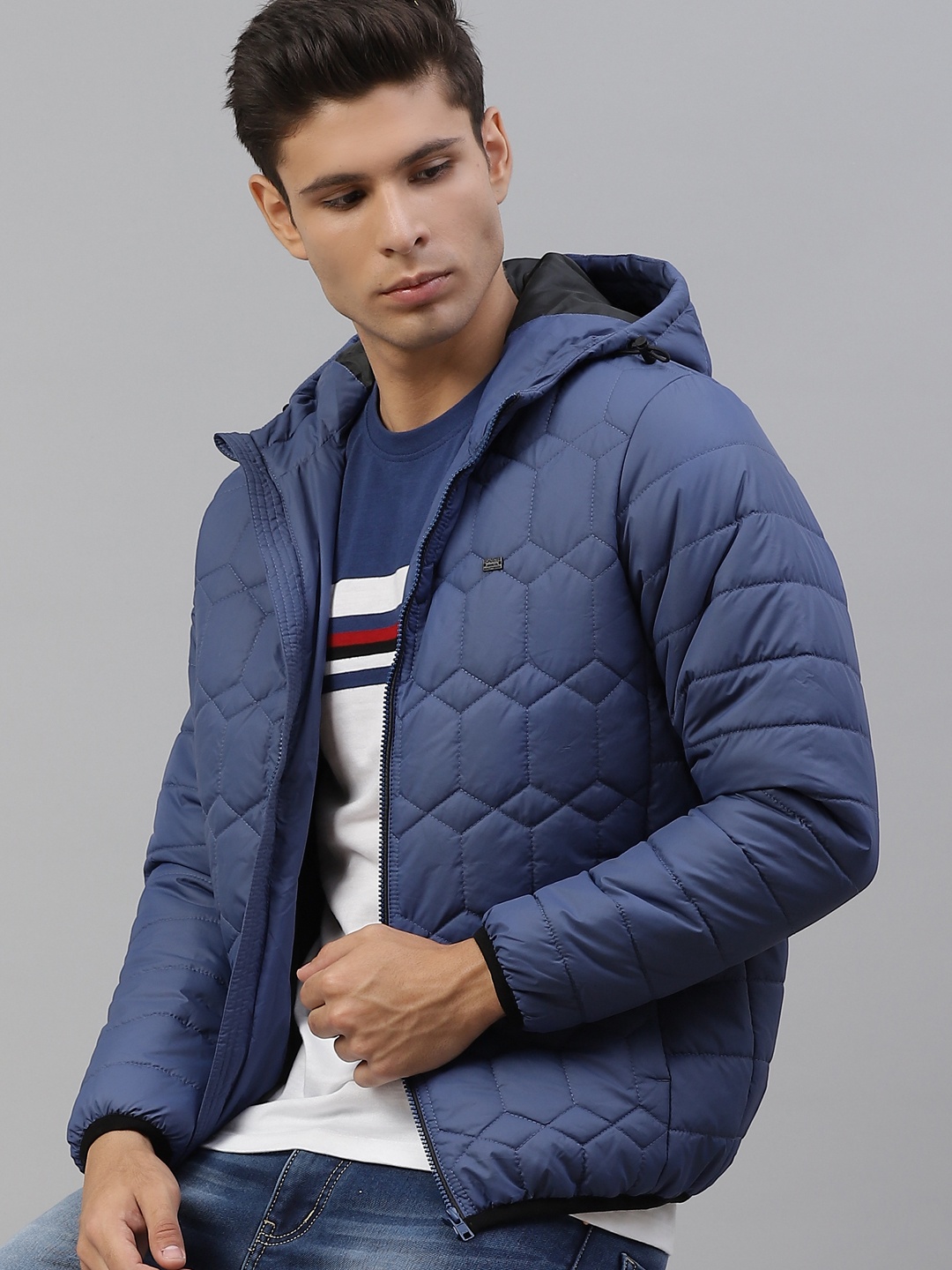 

Roadster Men Blue Hooded Quilted Jacket