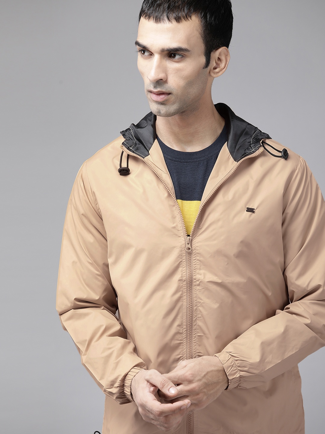 

Roadster Men Beige Solid Tailored Hooded Jacket