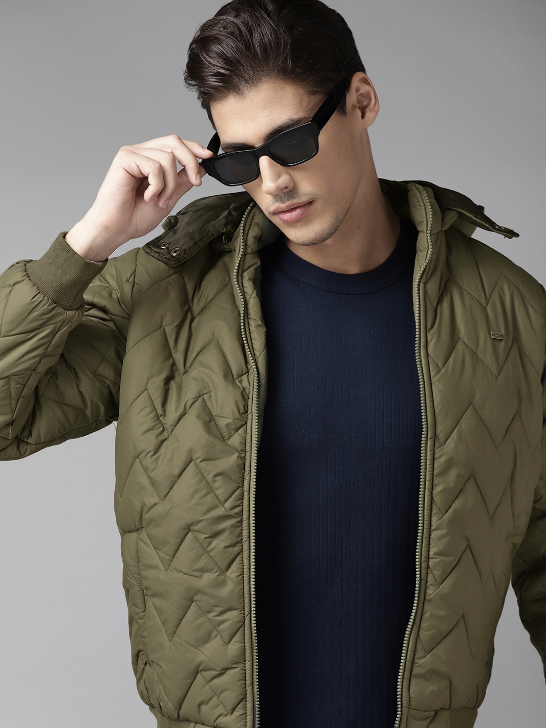 

Roadster Men Olive Green Solid Quilted Bomber Jacket with Detachable Hood