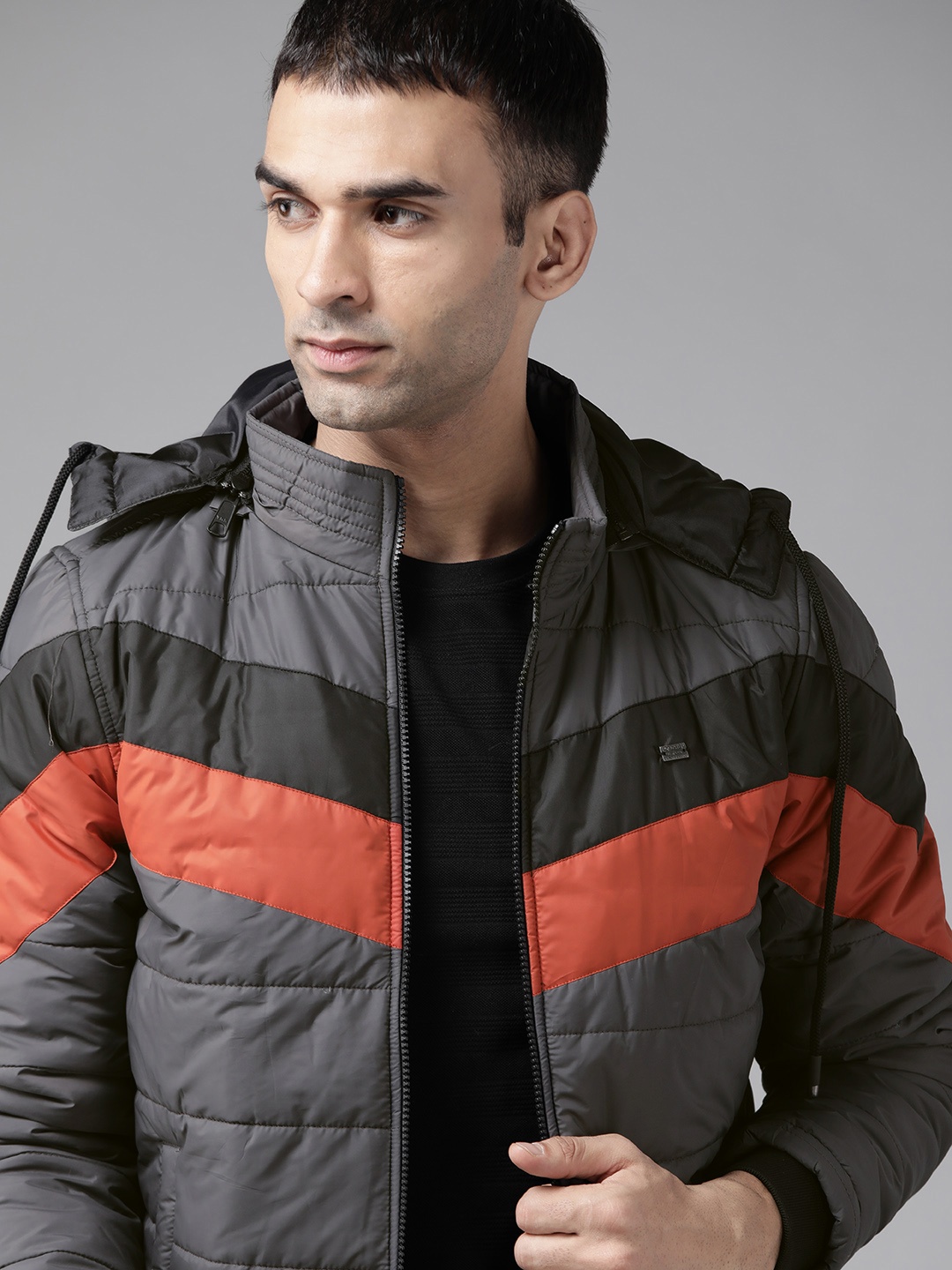 

Roadster Men Charcoal Grey & Rust Orange Striped Padded Jacket with Detachable Hood