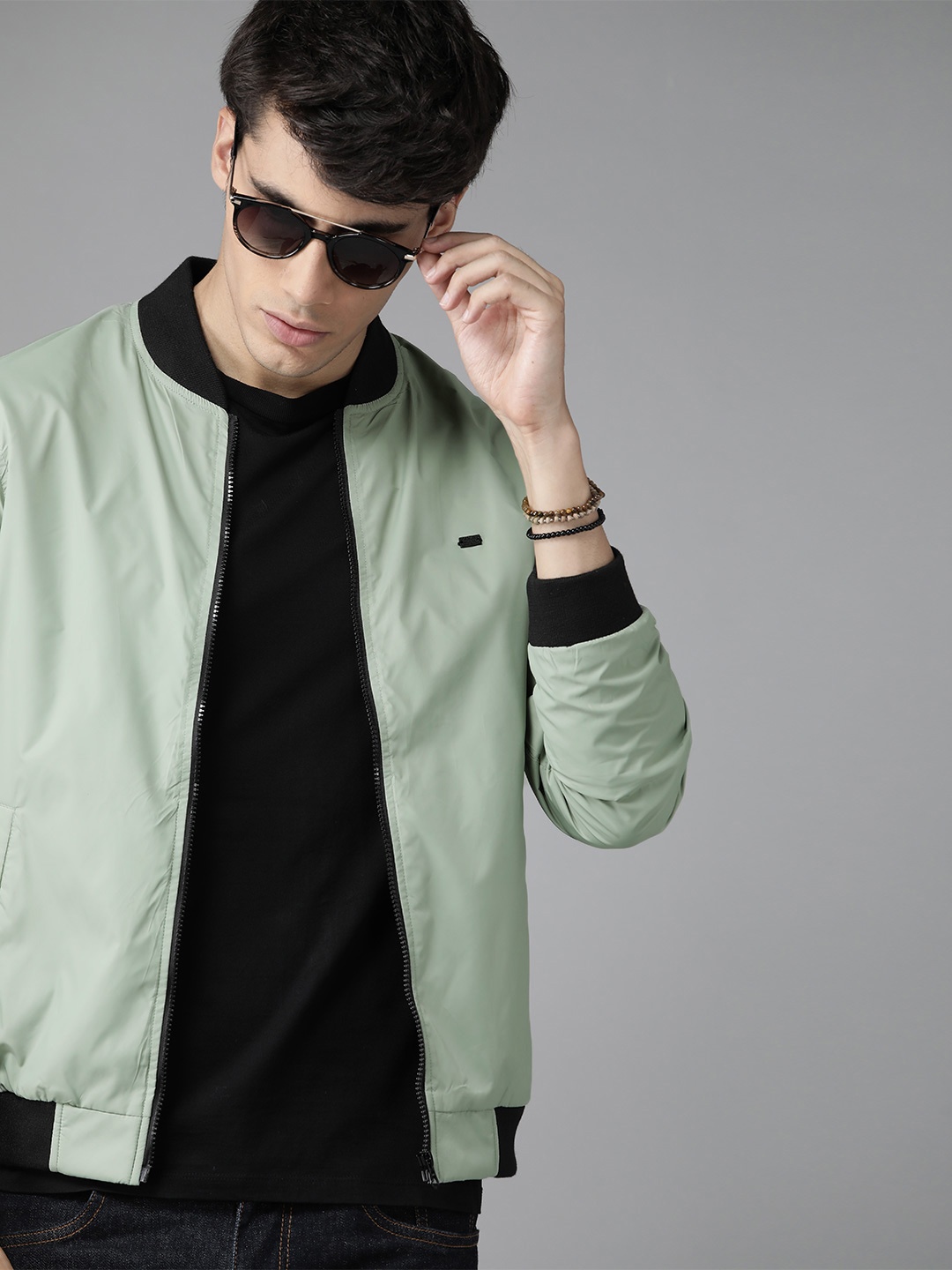 

Roadster Men Green Solid Bomber Jacket