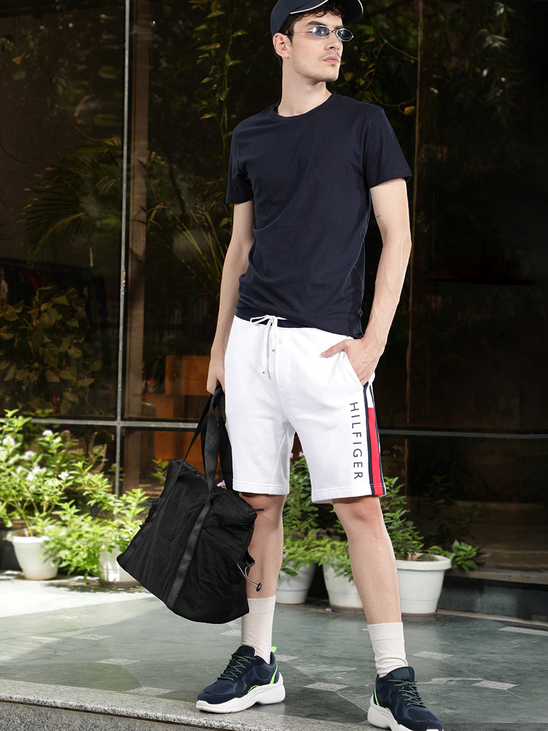 

Tommy Hilfiger Men White Solid Mid-Rise Regular Shorts