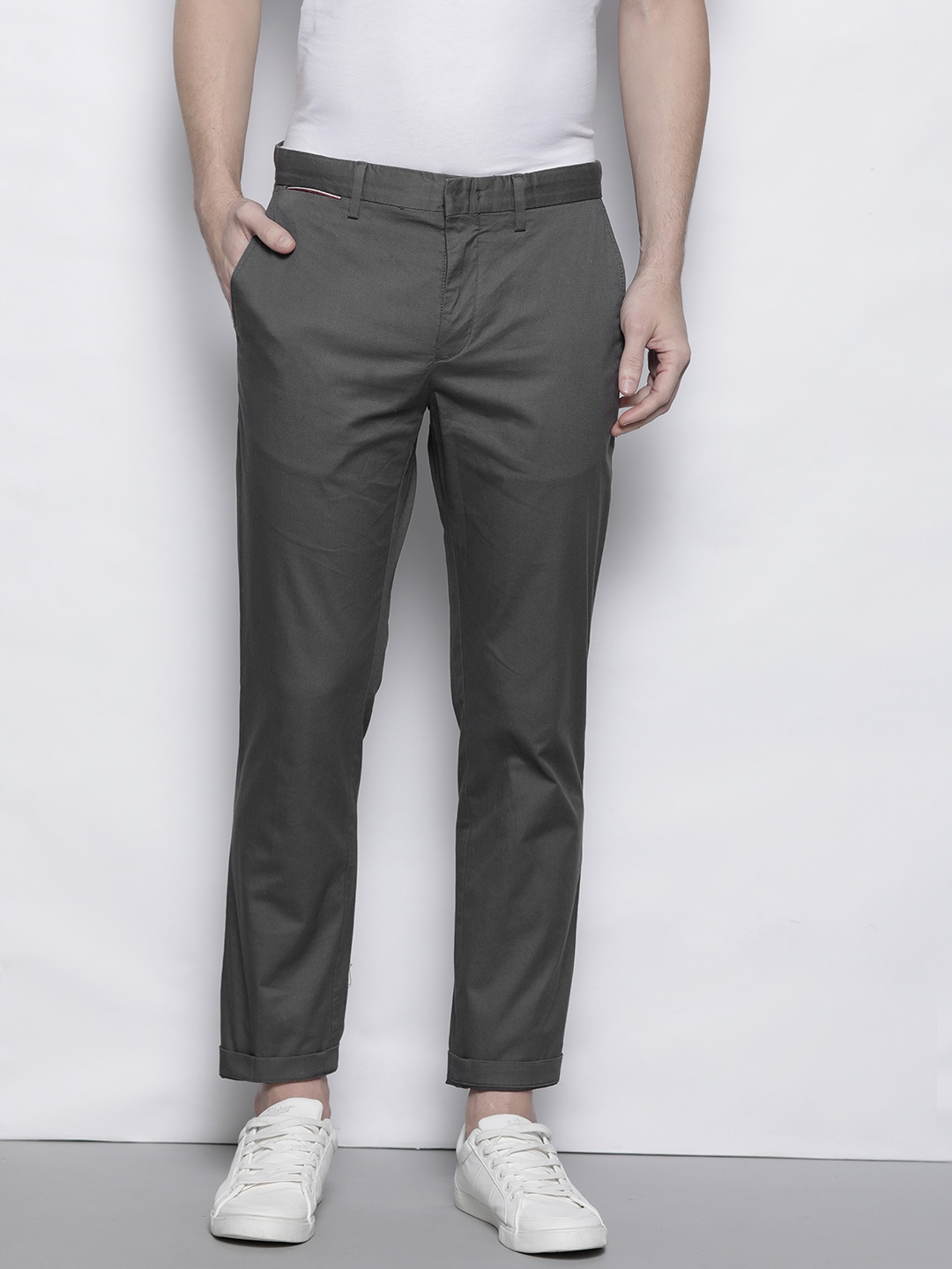 

Tommy Hilfiger Men Charcoal Grey Solid Straight Fit Chinos Trousers