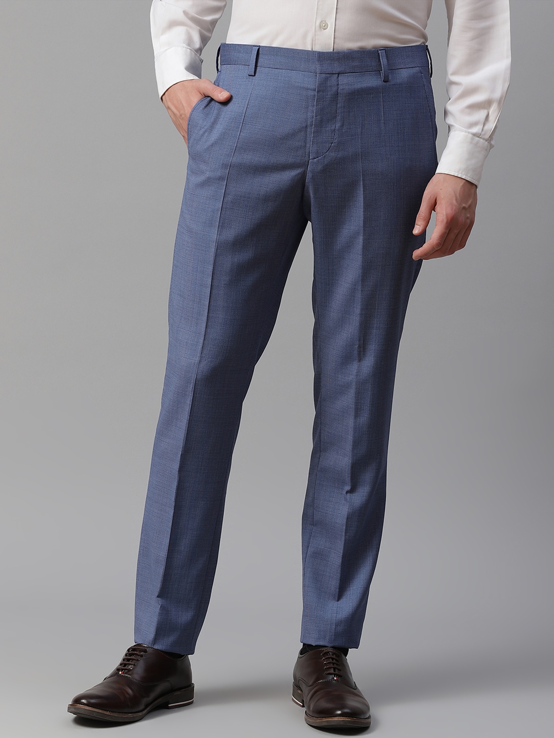 

Tommy Hilfiger Men Blue Self-Design Slim Fit Formal Trousers