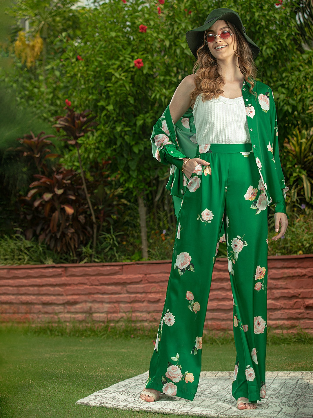 

MANGO Women Green & Peach Coloured Floral Print Flared Trousers