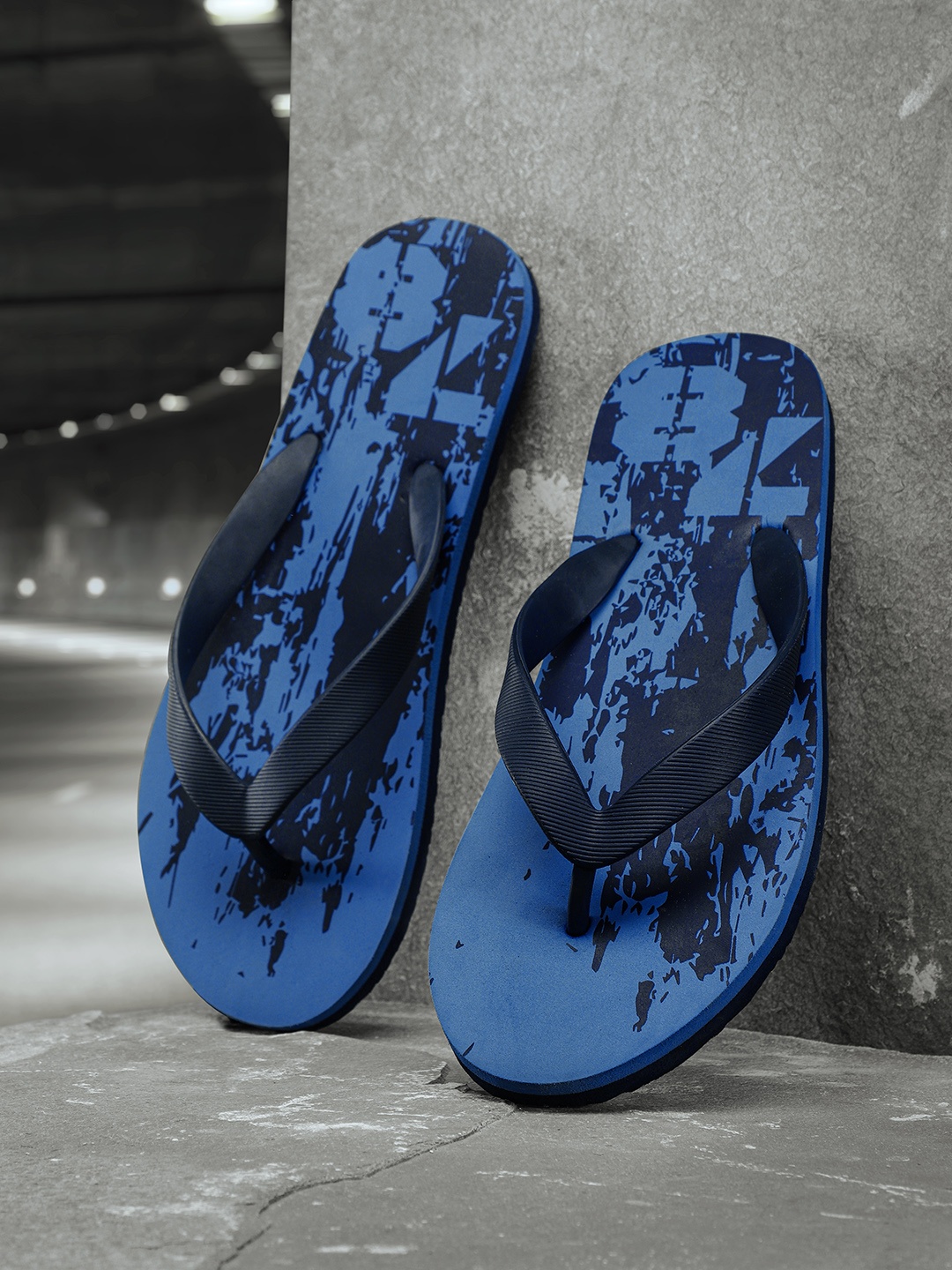 

Roadster Men Navy Blue Printed Thong Flip-Flops