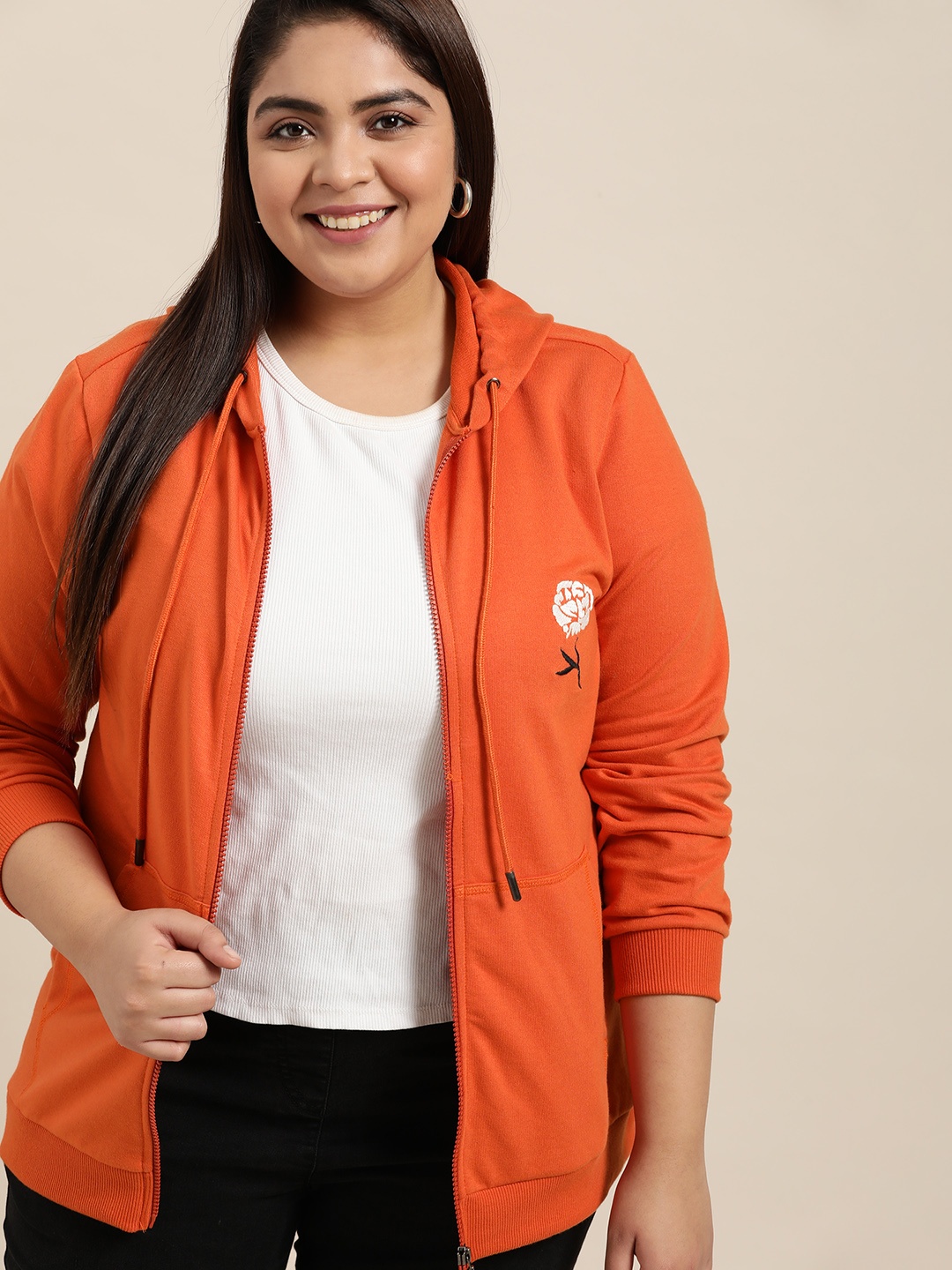 

Sztori Women Plus Size Rust Orange Solid Hooded Sweatshirt with Floral Applique Detail