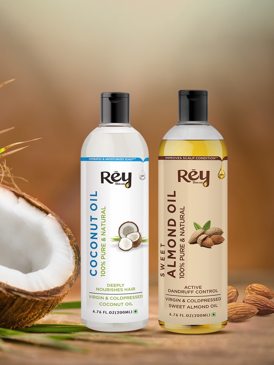

Rey Naturals Cold Pressed Coconut Oil & Sweet Almond Oil - for hair & skin - 200ml + 200ml, Transparent