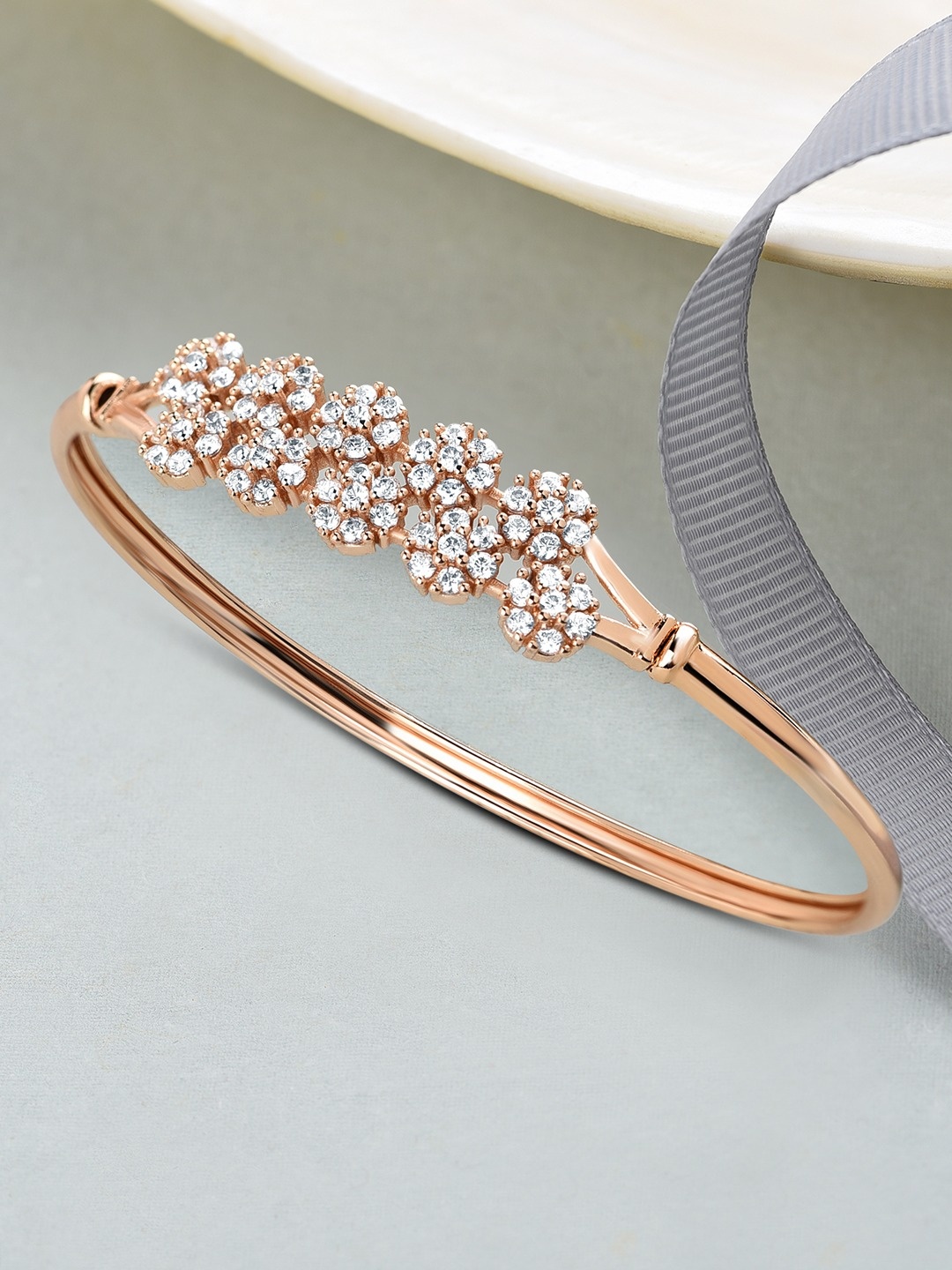 

Zaveri Pearls White Rose Gold-Plated Cubic Zirconia Flowers Kada Bracelet