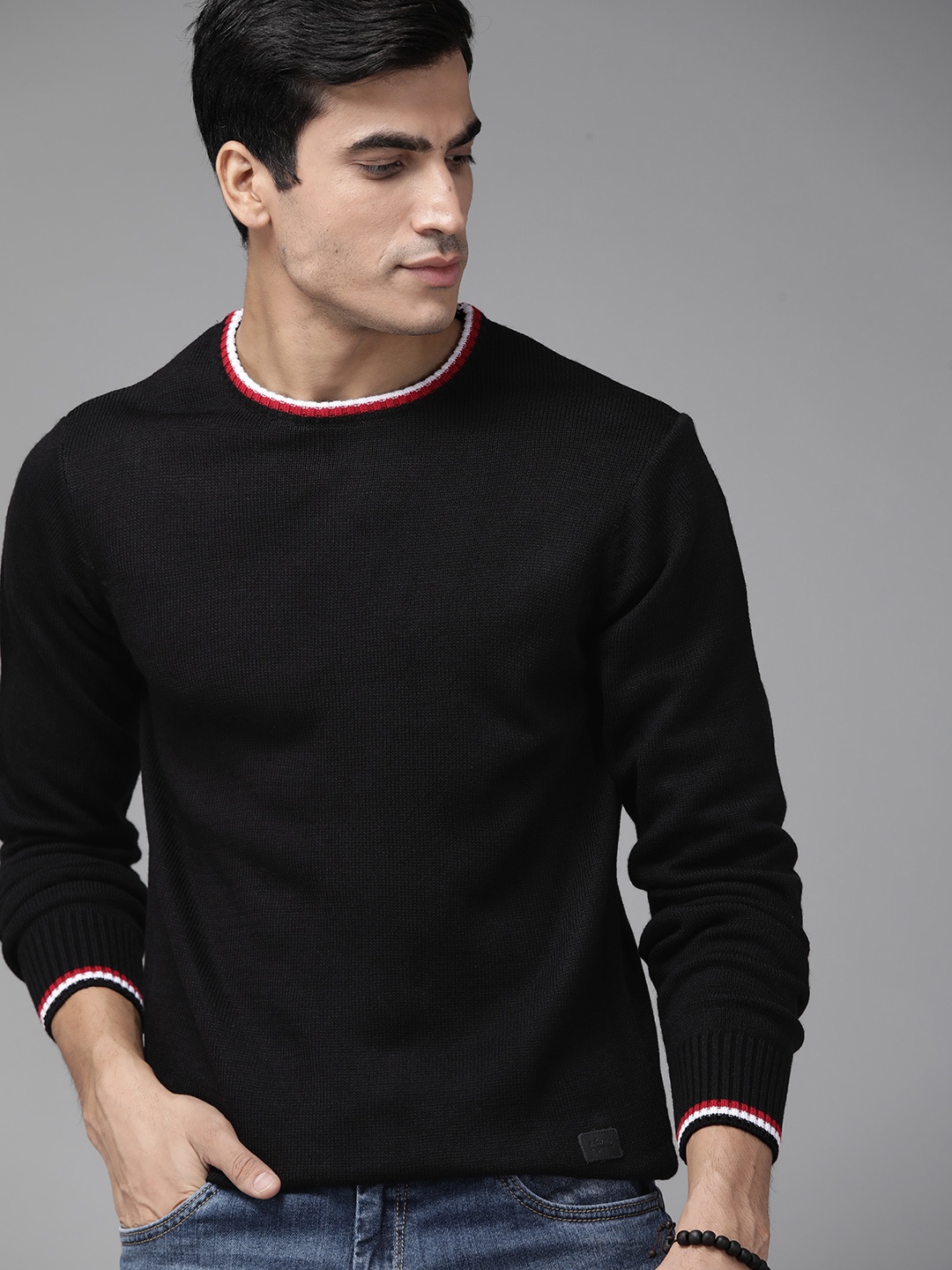 

Roadster Men Black Solid Pullover Sweater