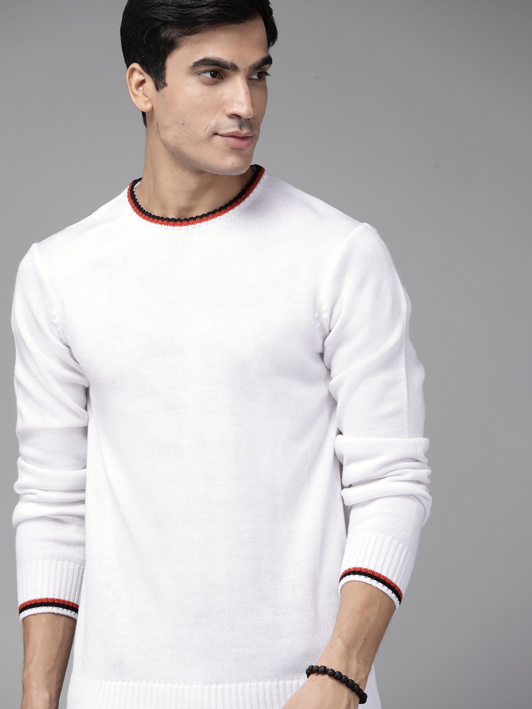 

Roadster Men White Solid Pullover Sweater