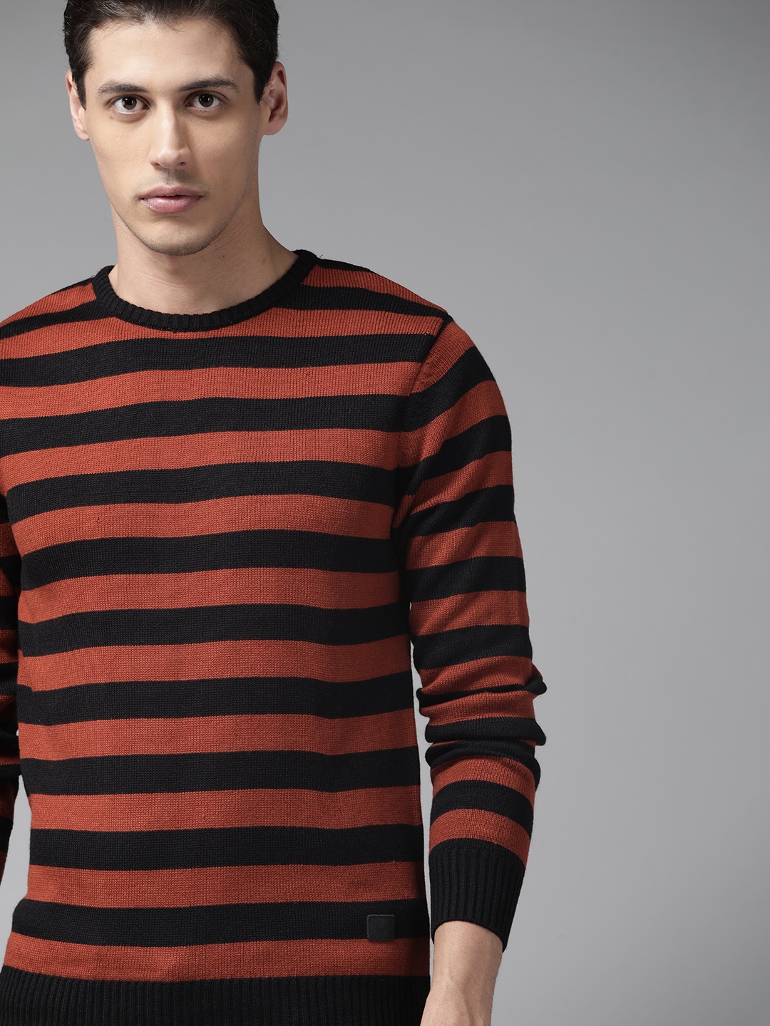 

Roadster Men Black & Rust Orange Striped Pullover