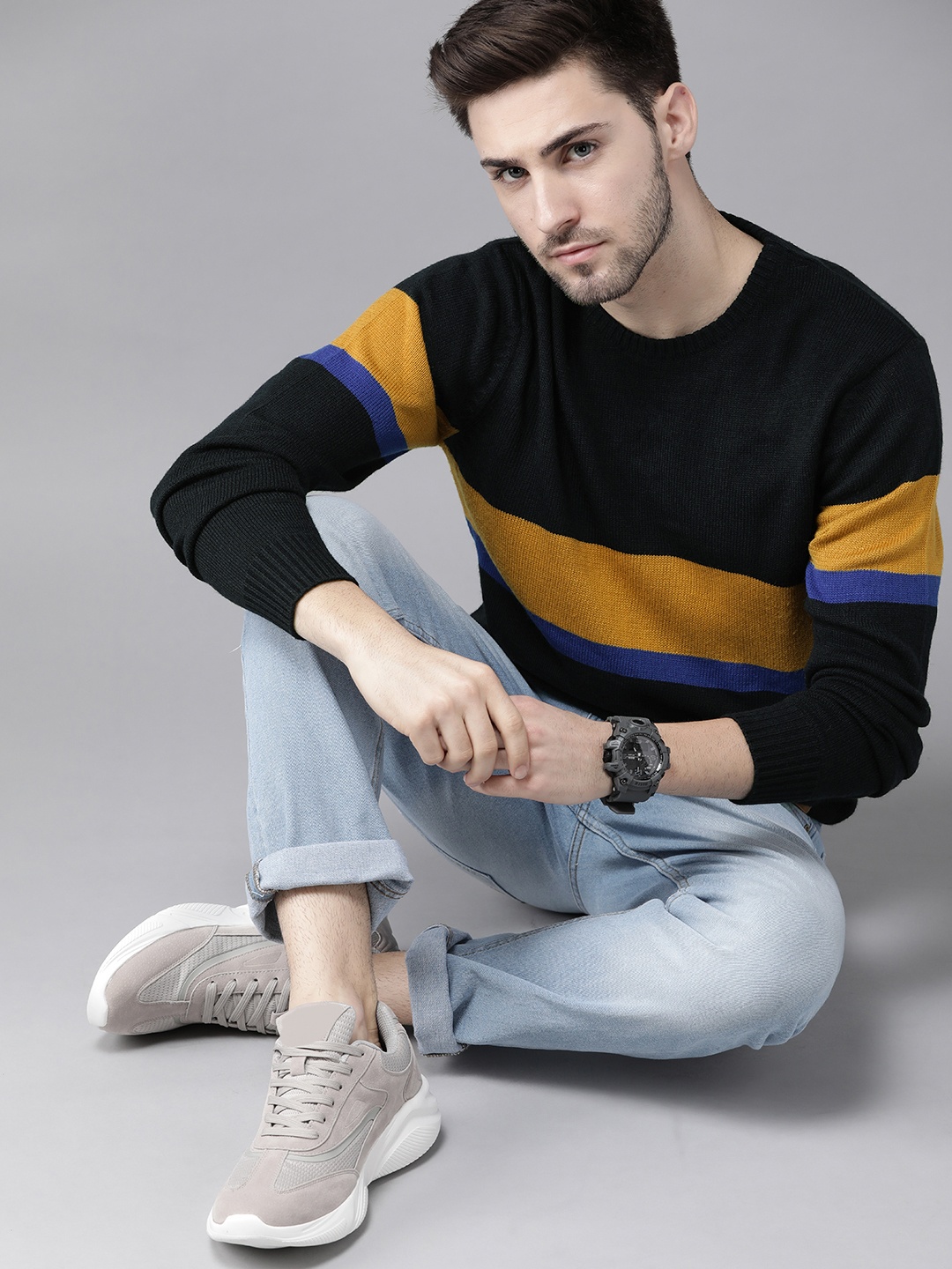

Roadster Men Navy Blue & Mustard Striped Pullover Sweater