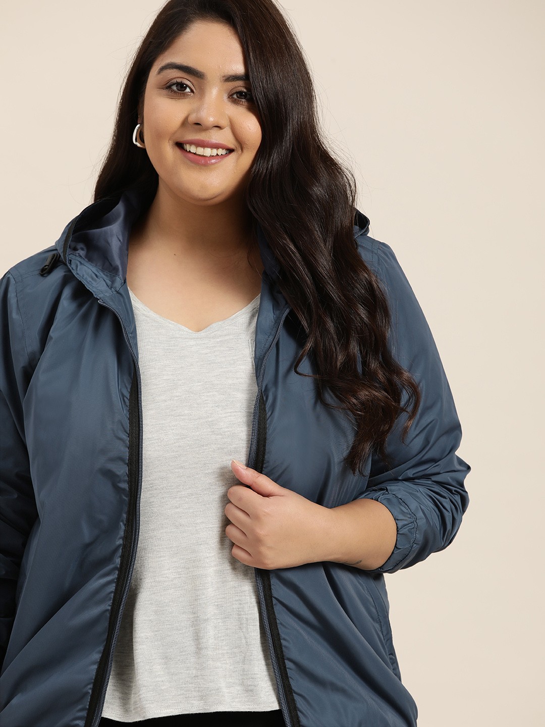 

Sztori Women Plus Size Navy Blue Solid Lightweight Hooded Windcheater Jacket