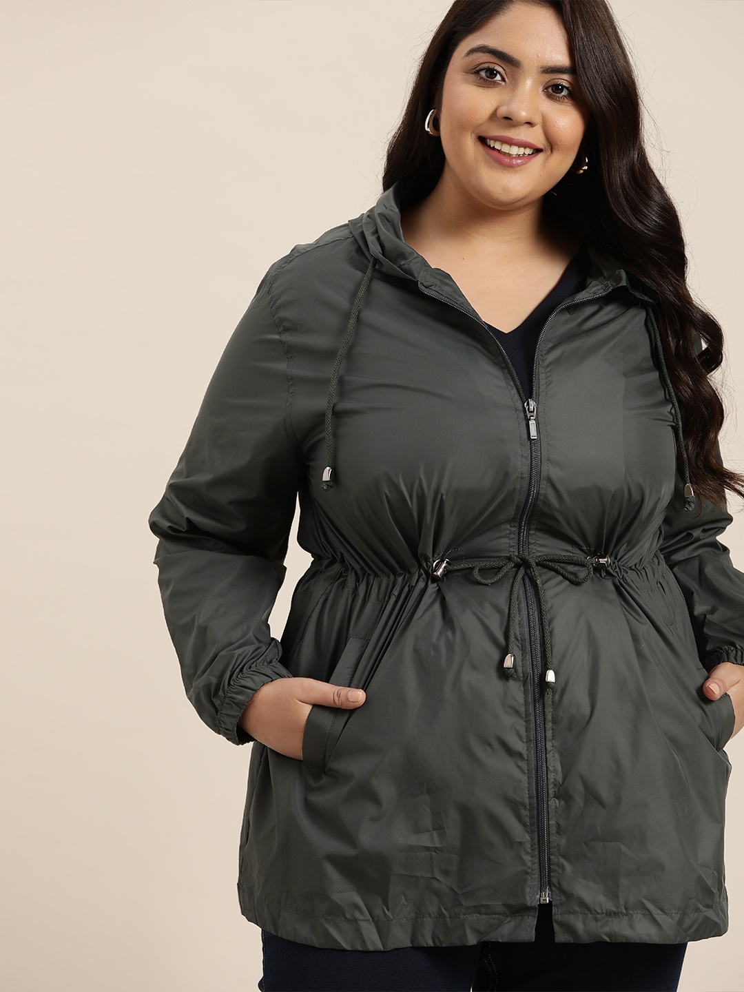 

Sztori Women Plus Size Olive Green Hooded Longline Packable Windcheater Jacket
