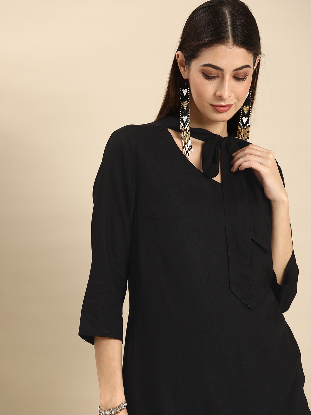 

Anouk Women Black Solid Flared Sleeves Kurta
