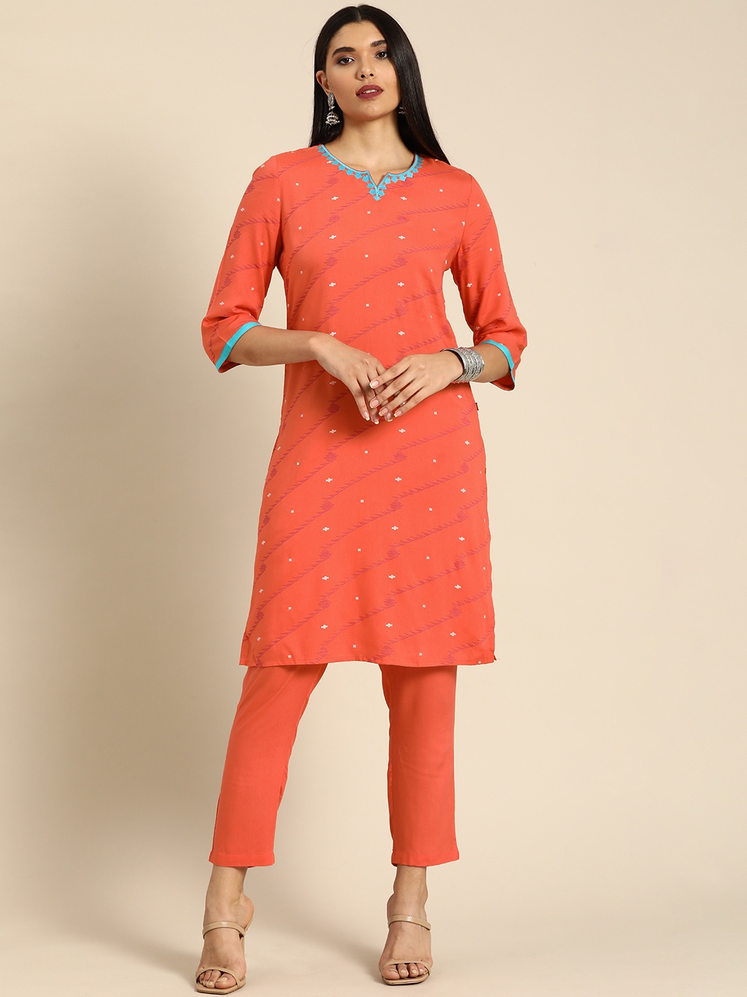 

Anouk Women Orange Ethnic Motifs Embroidered Regular Thread Work Kurta with Trousers