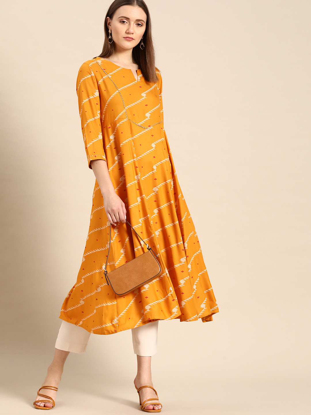 

Anouk Women Mustard Yellow & Off White Printed Kurta