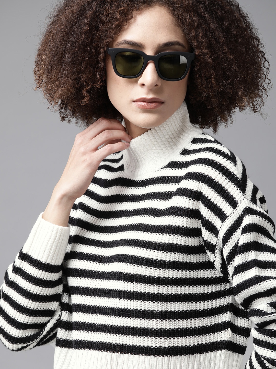 

Roadster Women Black & Off White Striped Pullover