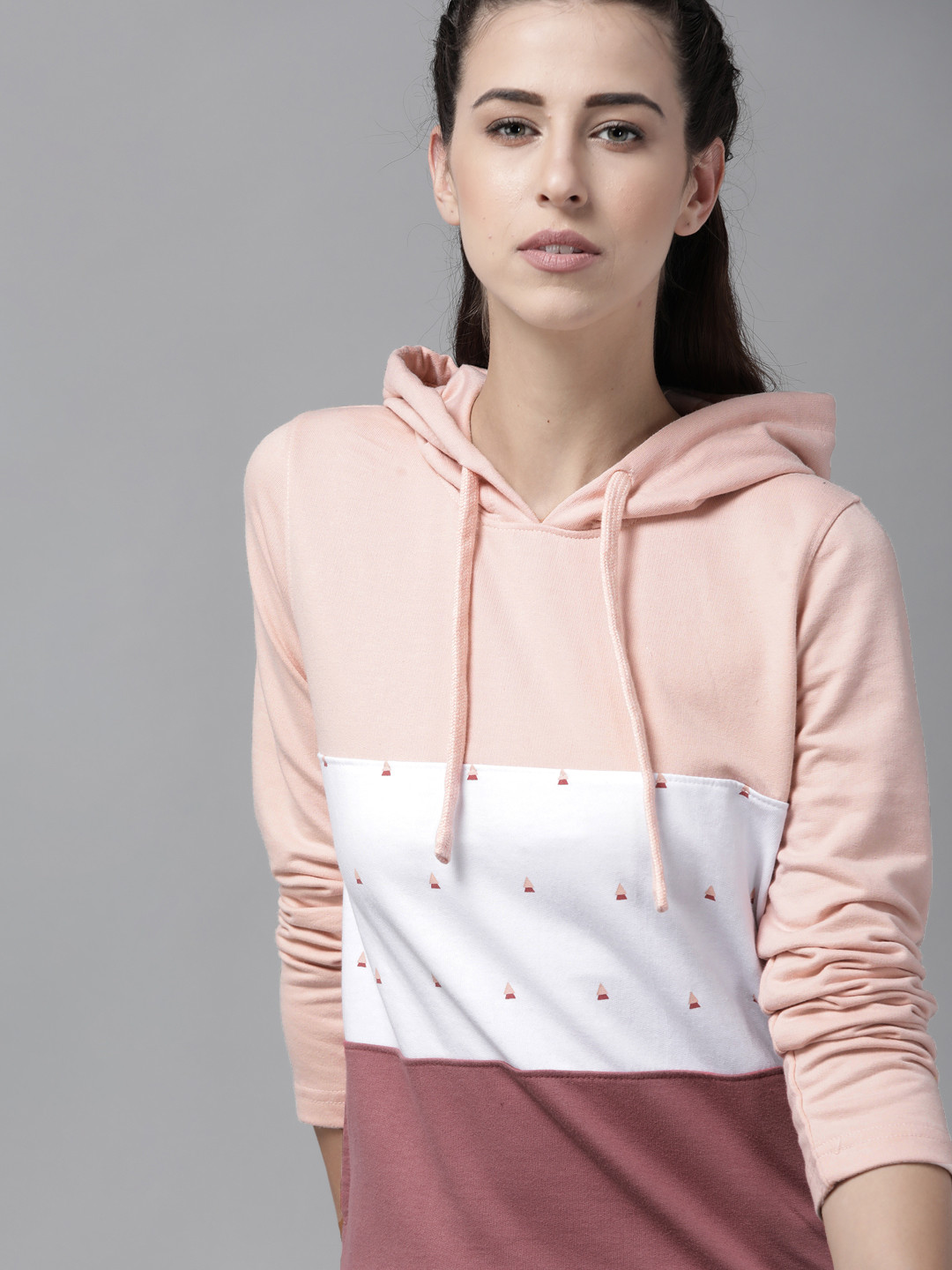 

Roadster Women Peach-Coloured & Pink Colourblocked Hooded Sweatshirt