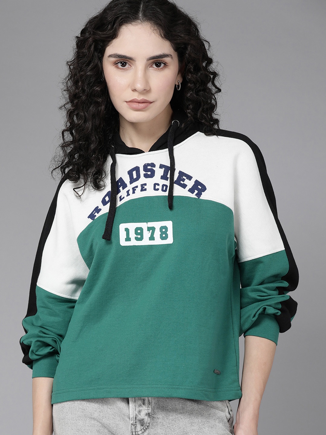 

Roadster Women White & Green Colourblocked Hooded Sweatshirt