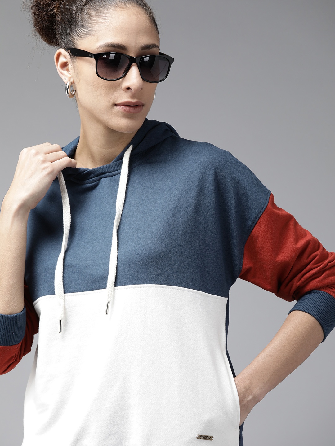 

Roadster Women Navy Blue & White Colourblocked Hooded Sweatshirt