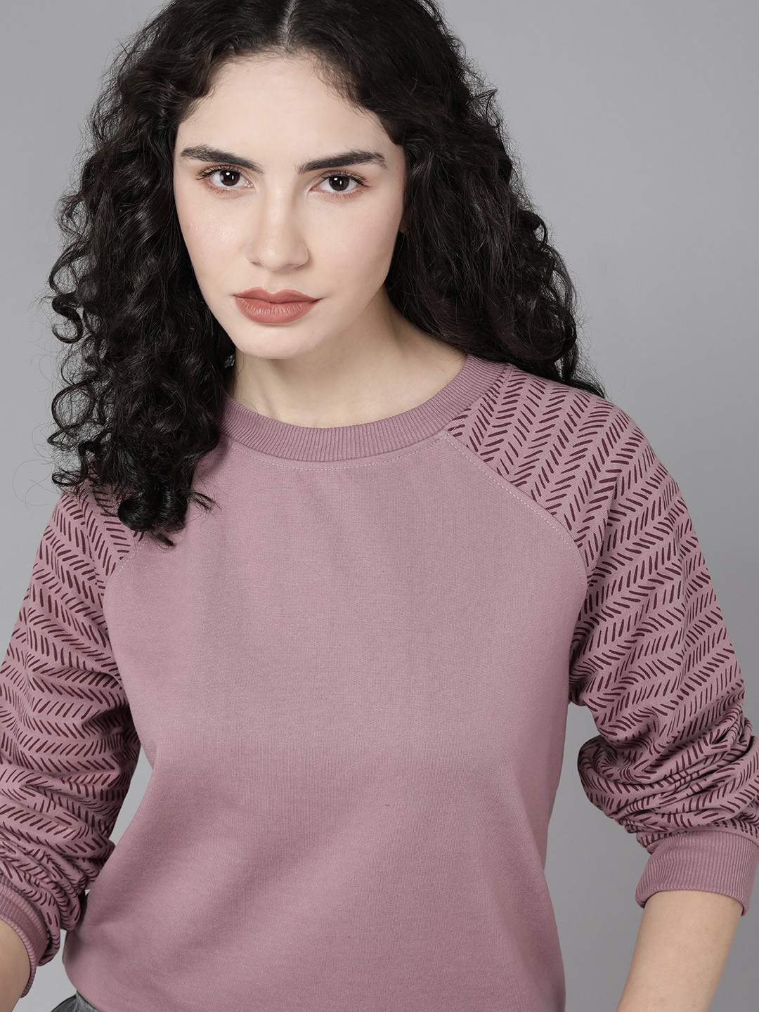 

Roadster Women Mauve Solid Sweatshirt