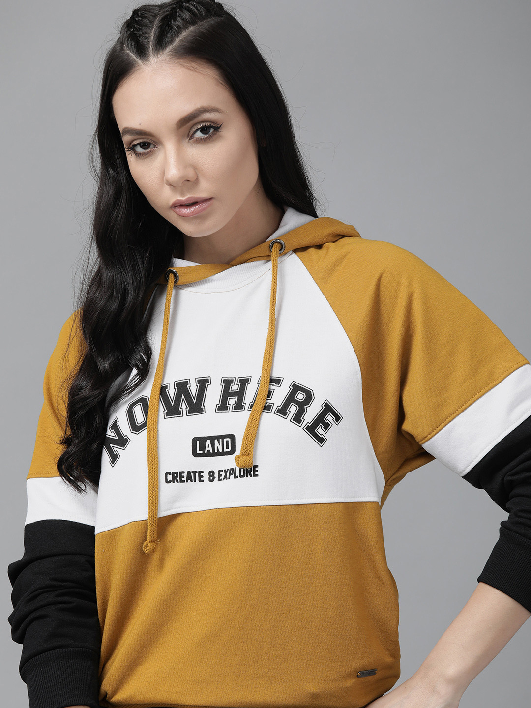 

Roadster Women Mustard Yellow & White Colourblocked Hooded Sweatshirt