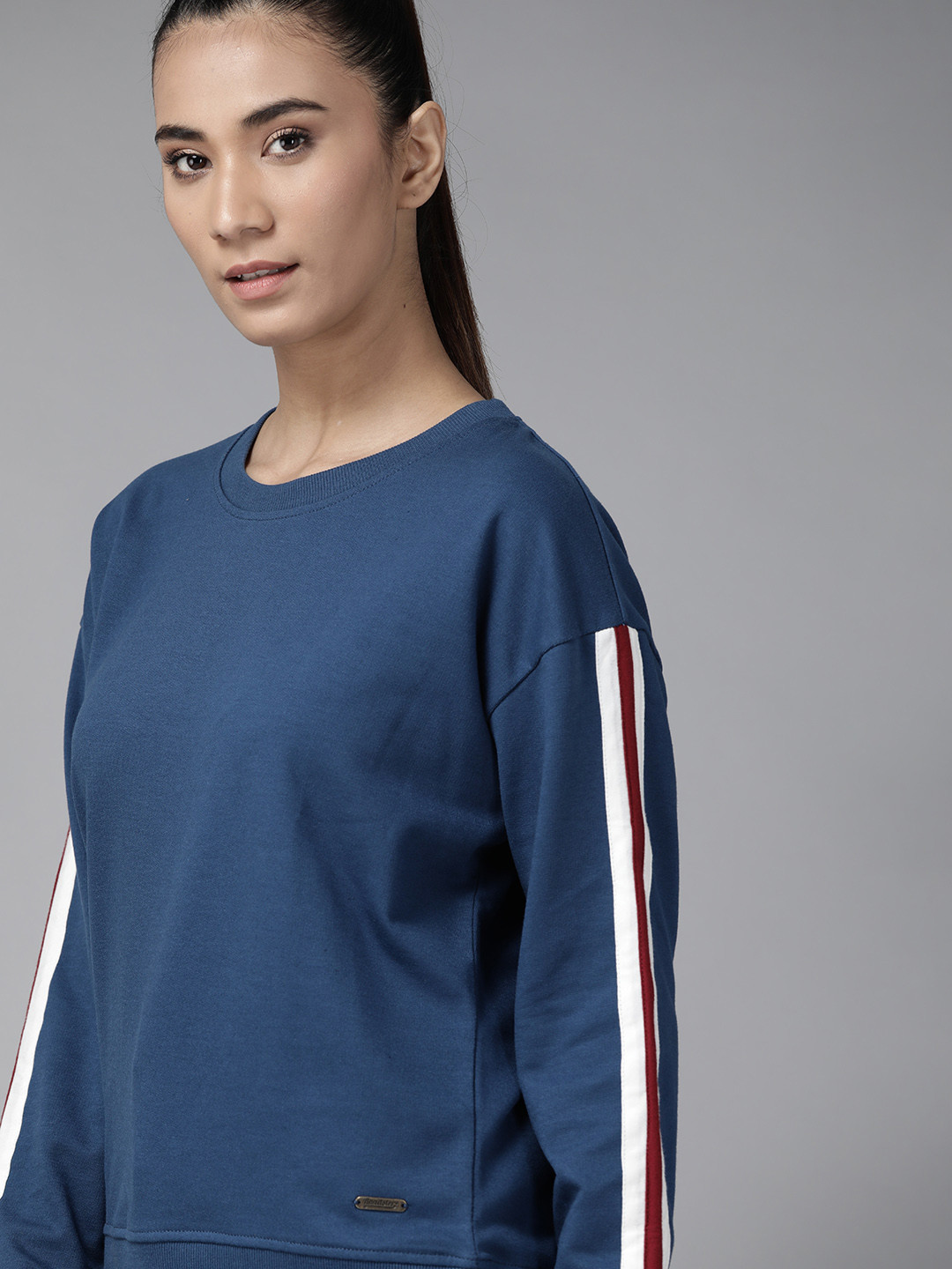 

Roadster Women Navy Blue Solid Sweatshirt