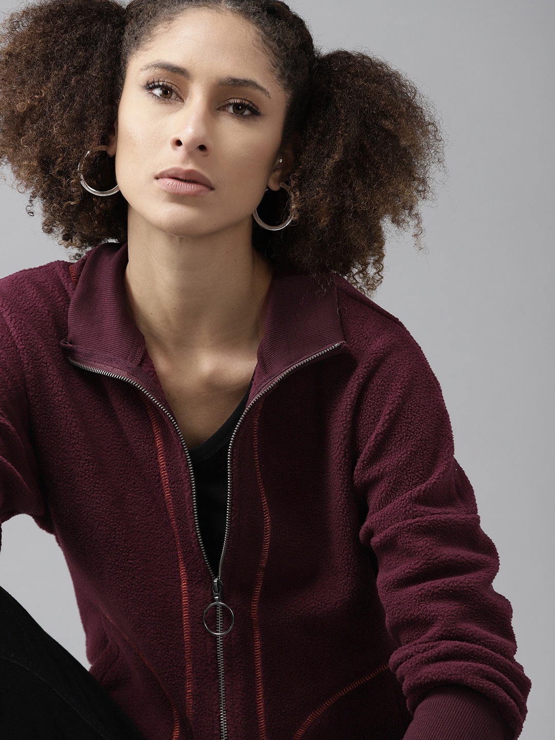 

Roadster Women Burgundy Solid Sweatshirt
