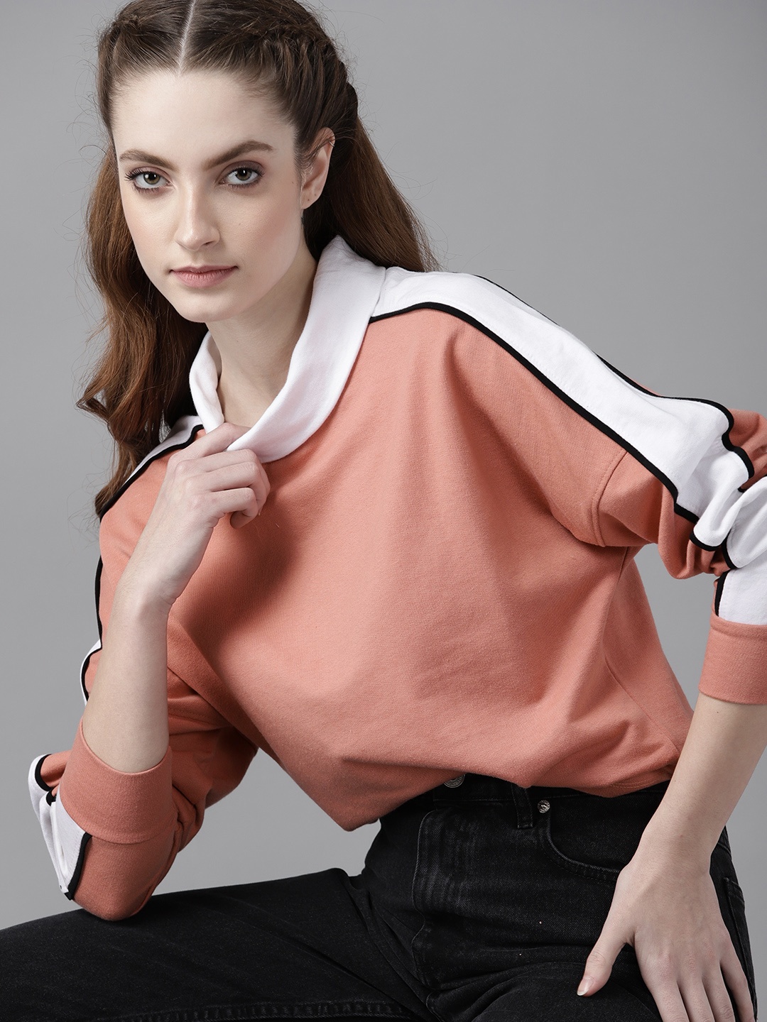 

Roadster Women Peach-Coloured Solid Turtle Neck Sweatshirt