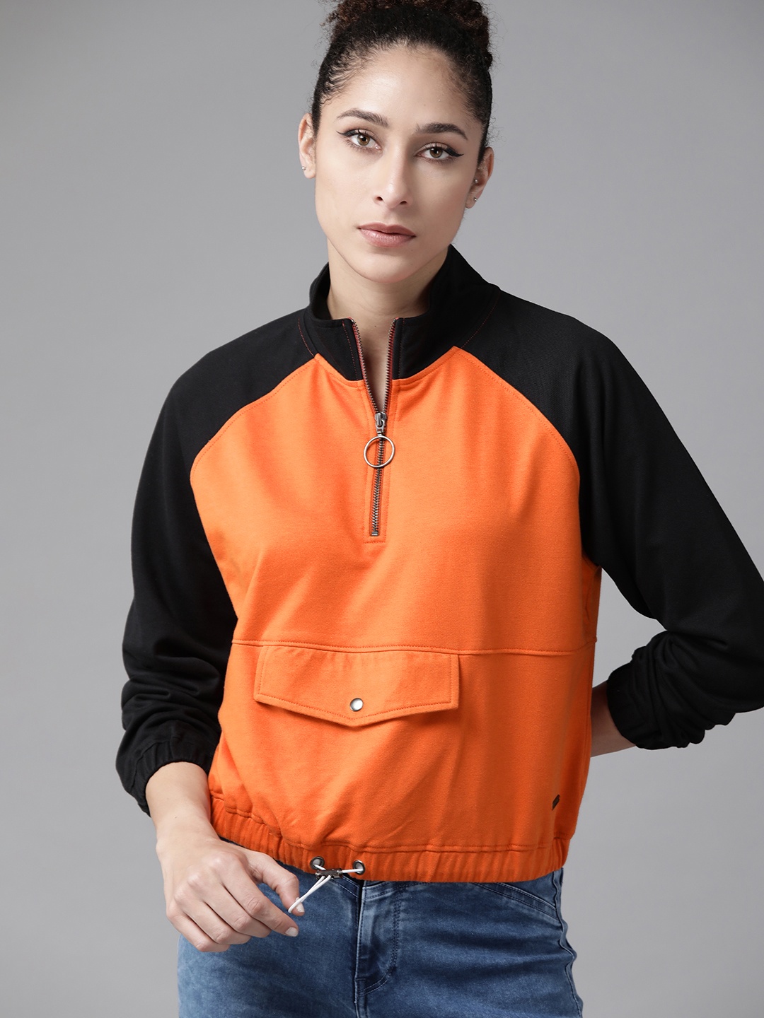 

Roadster Women Orange & Black Solid Sweatshirt
