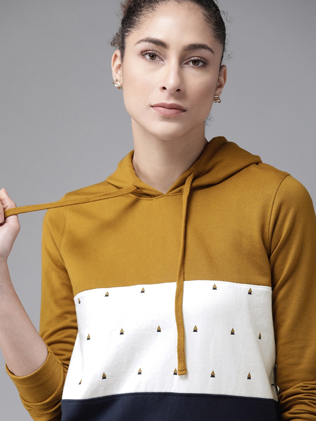 

Roadster Women Mustard Yellow & White Colourblocked Hooded Sweatshirt