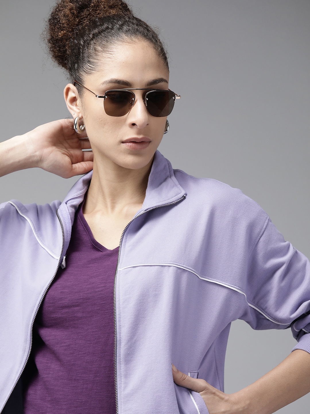 

Roadster Women Purple Solid Front-Open Sweatshirt