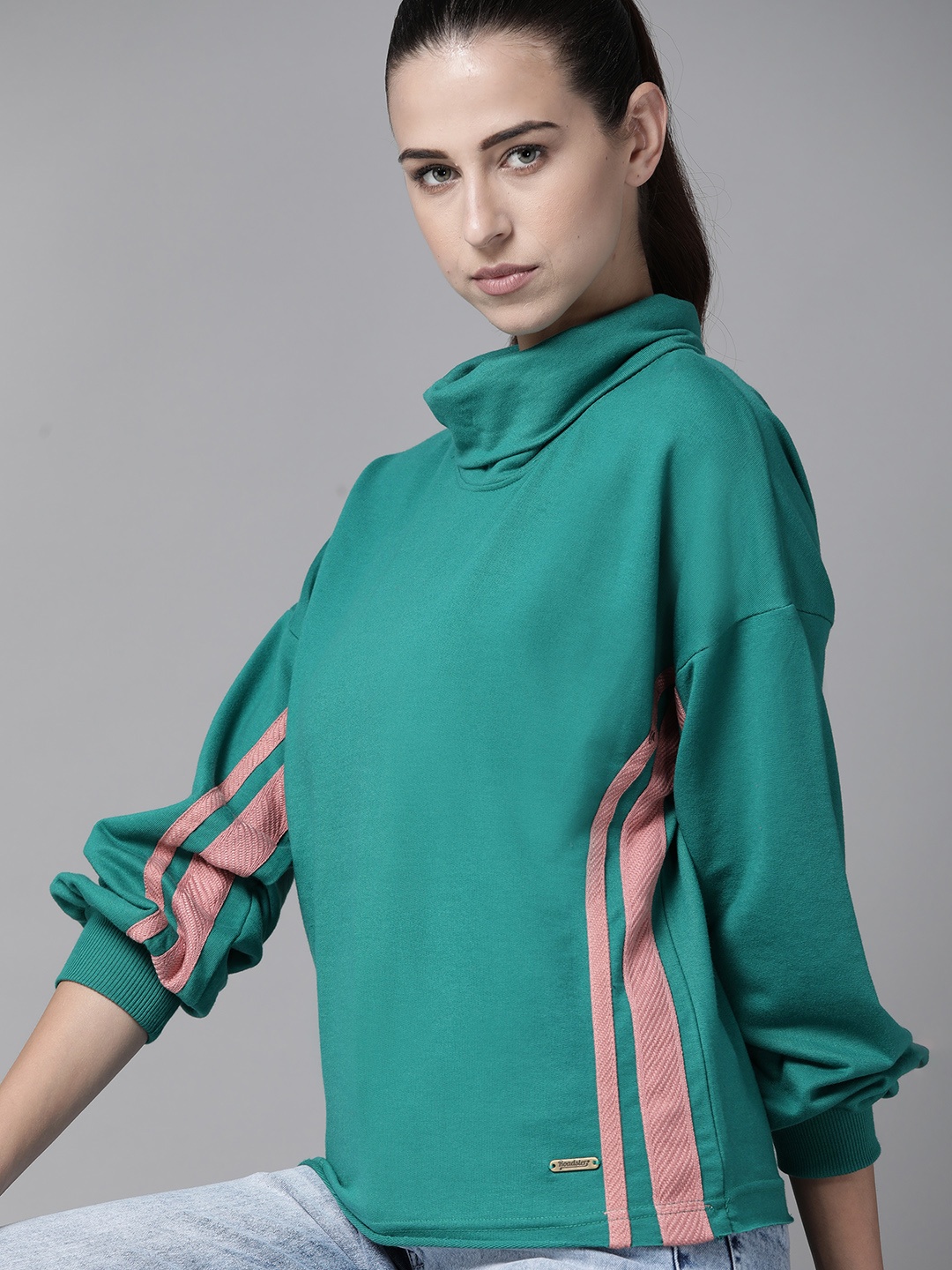 

Roadster Women Green Solid Turtle Neck Sweatshirt