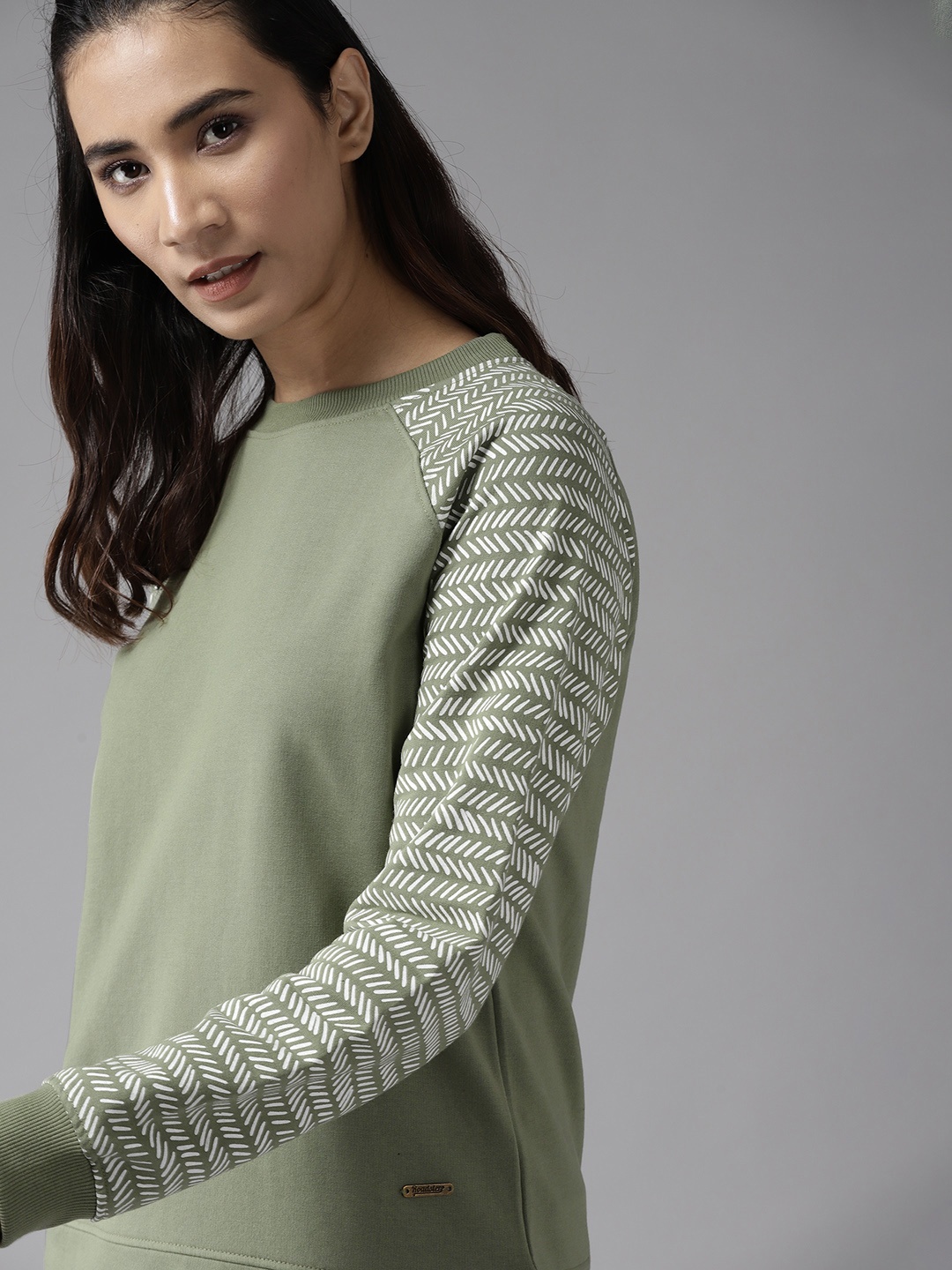 

Roadster Women Green Solid Sweatshirt