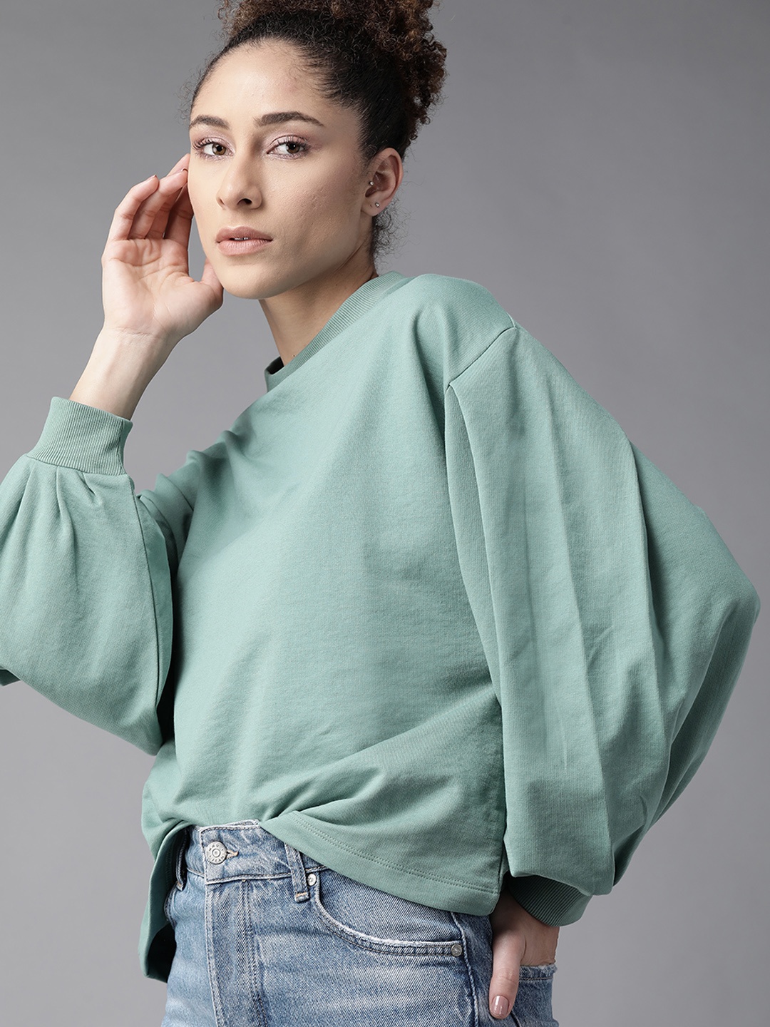 

Roadster Women Sea Green Solid Puff Sleeves Sweatshirt