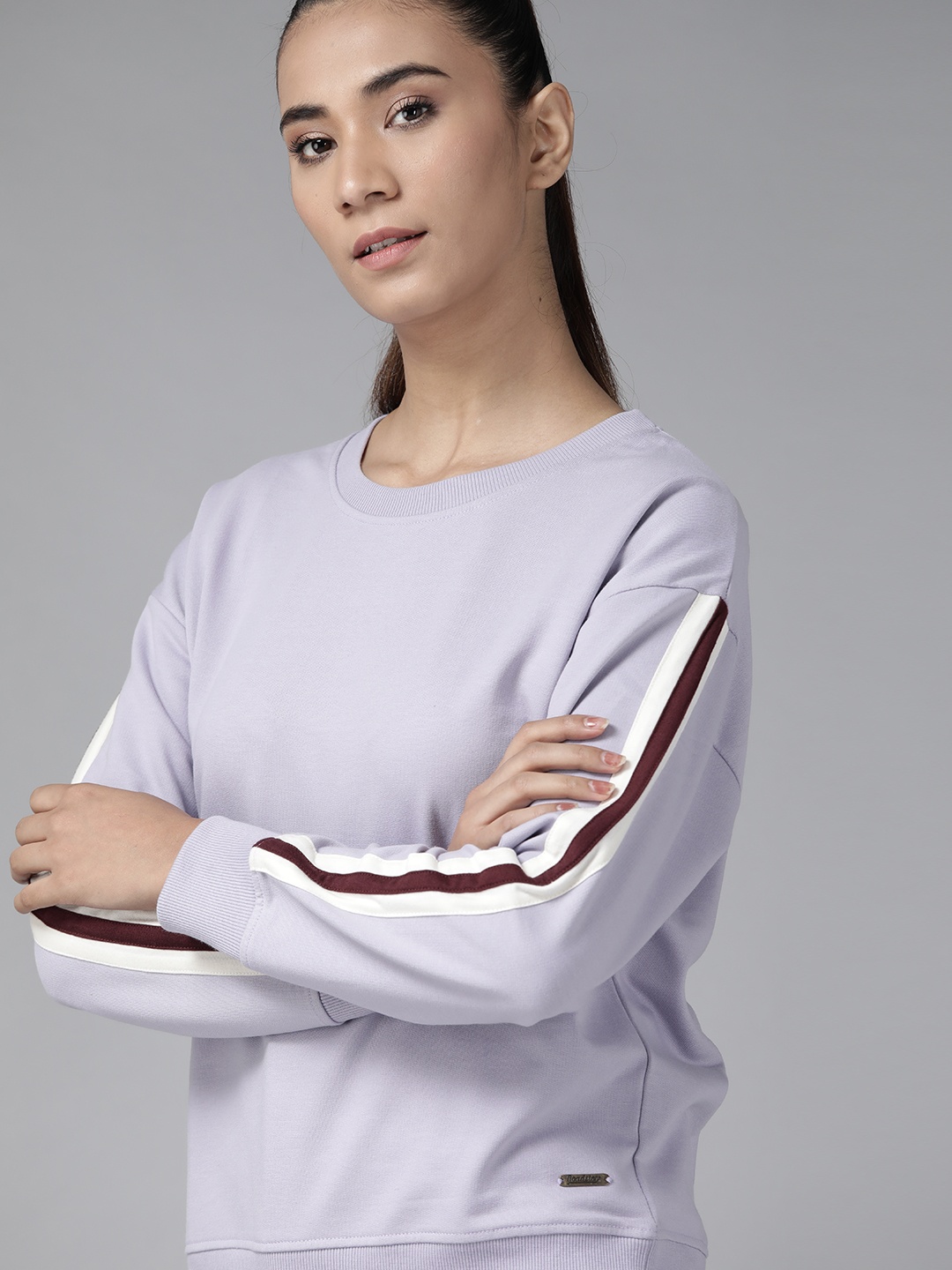 

Roadster Women Lavender Solid Sweatshirt