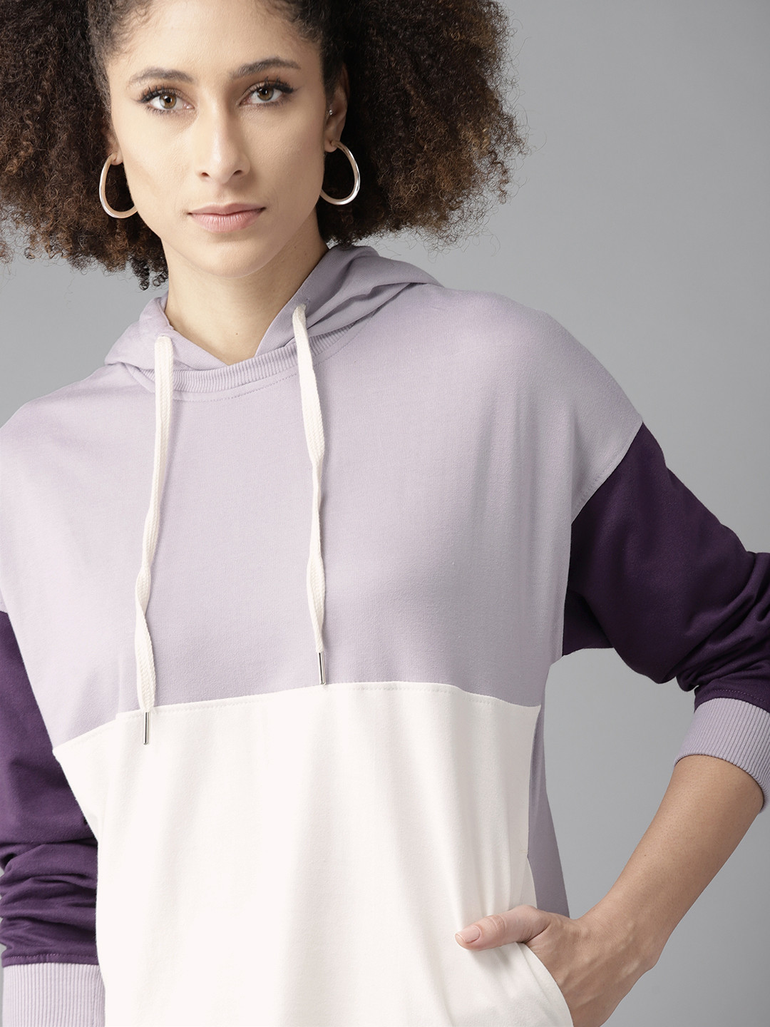 

Roadster Women Lavender & White Colourblocked Hooded Sweatshirt