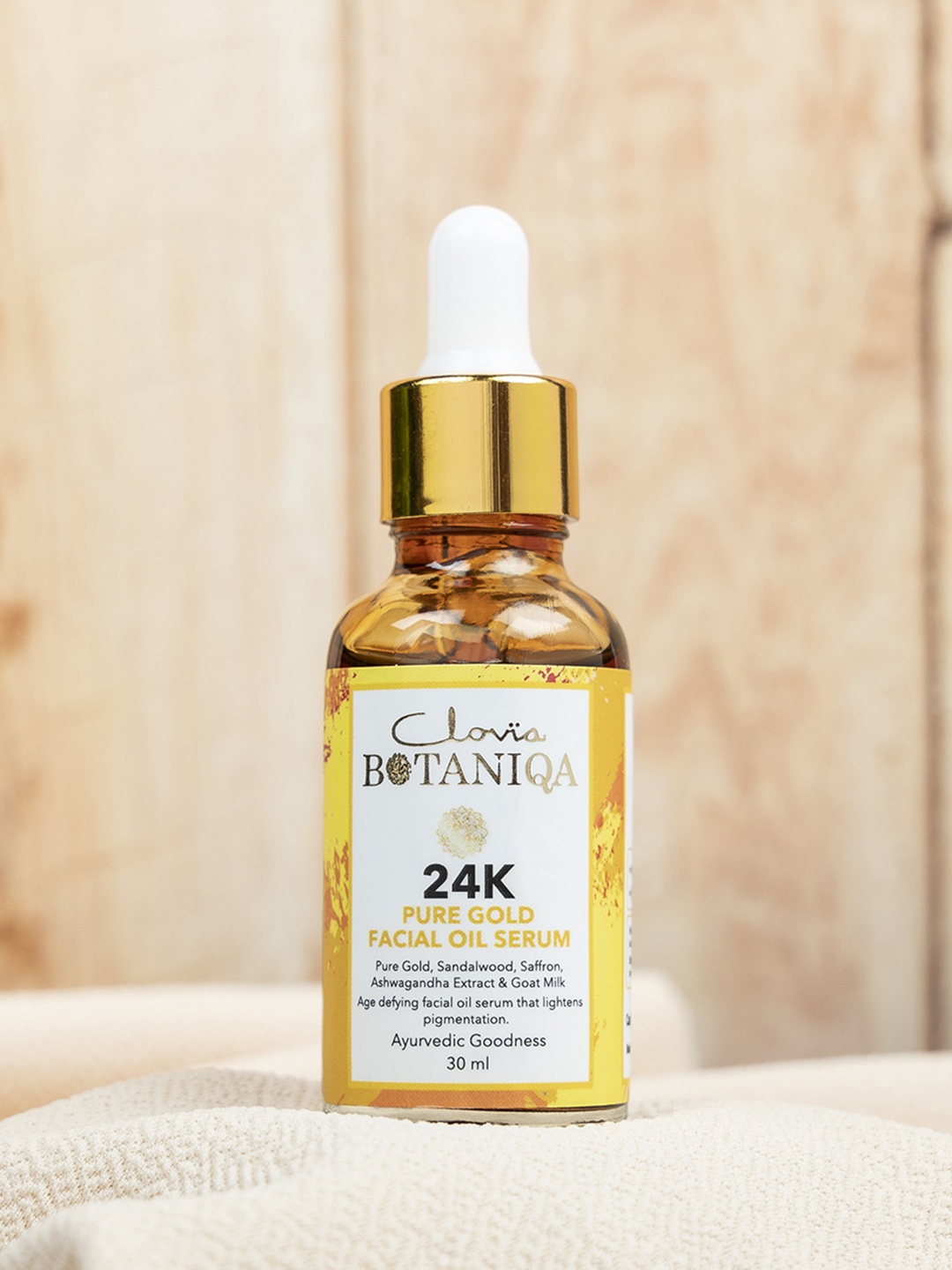 

Clovia BOTANIQA 24K Pure Gold Facial Oil Serum with Saffron & Goat Milk- 30ml, Transparent