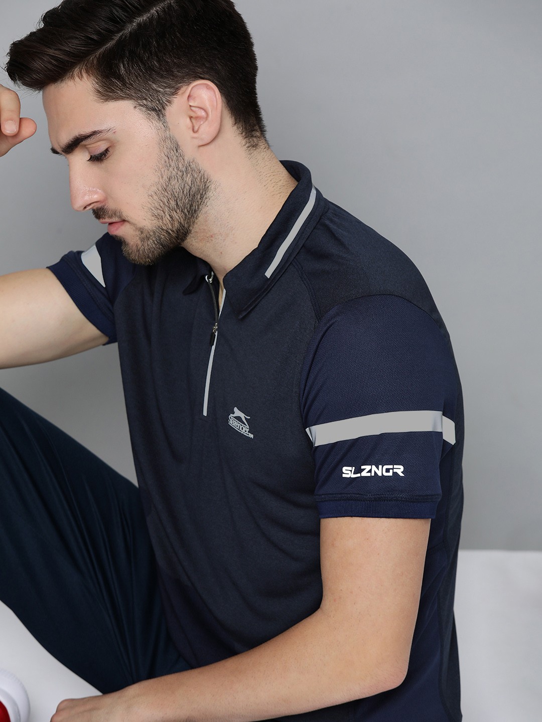 

Slazenger Men Navy Blue Solid Spread Collar T-shirt