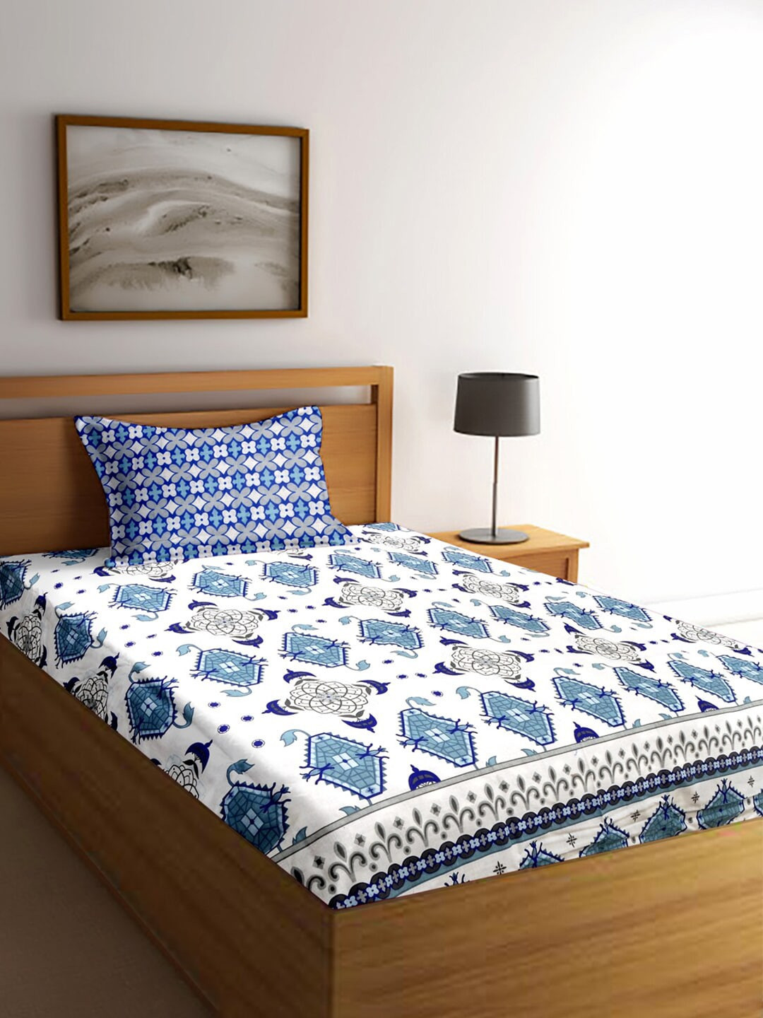 

Cortina White & Blue Ethnic Motifs 144 TC Cotton 1 Single Bedsheet with 1 Pillow Covers