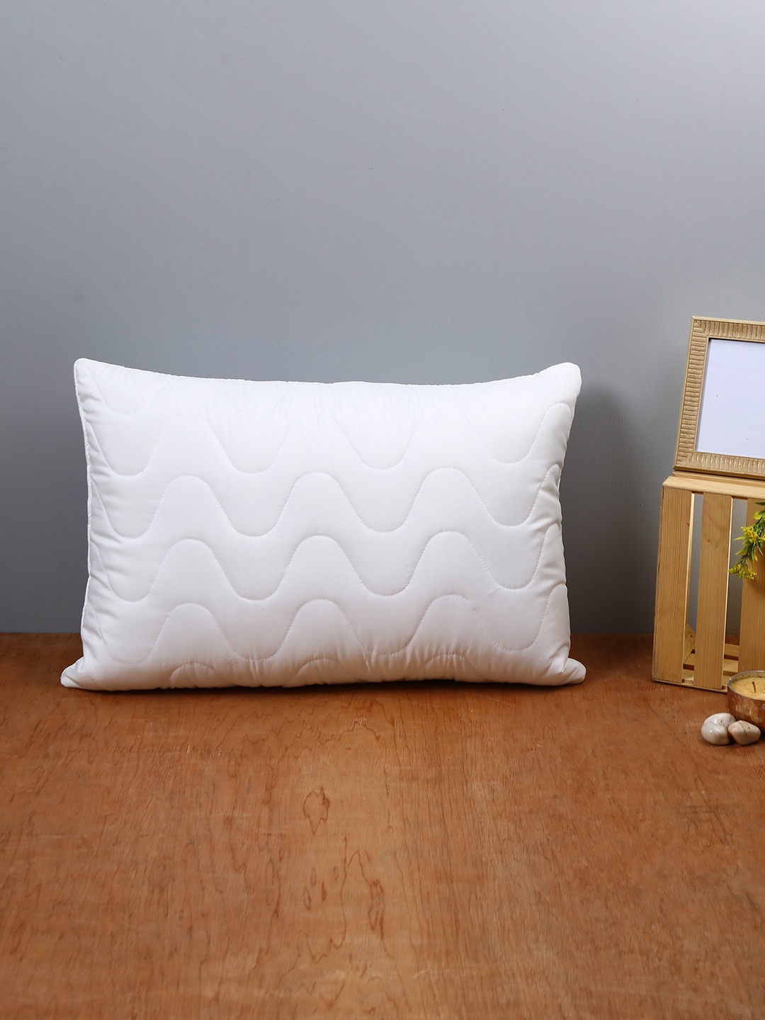 

Emerald White Quilted Pillow