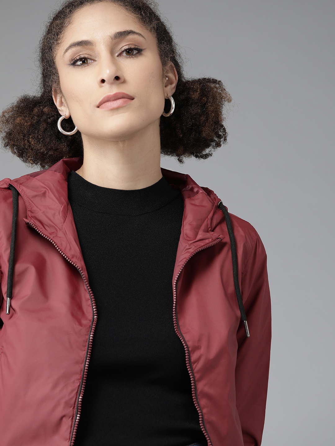 

Roadster Women Maroon Windcheater Hooded Bomber Jacket