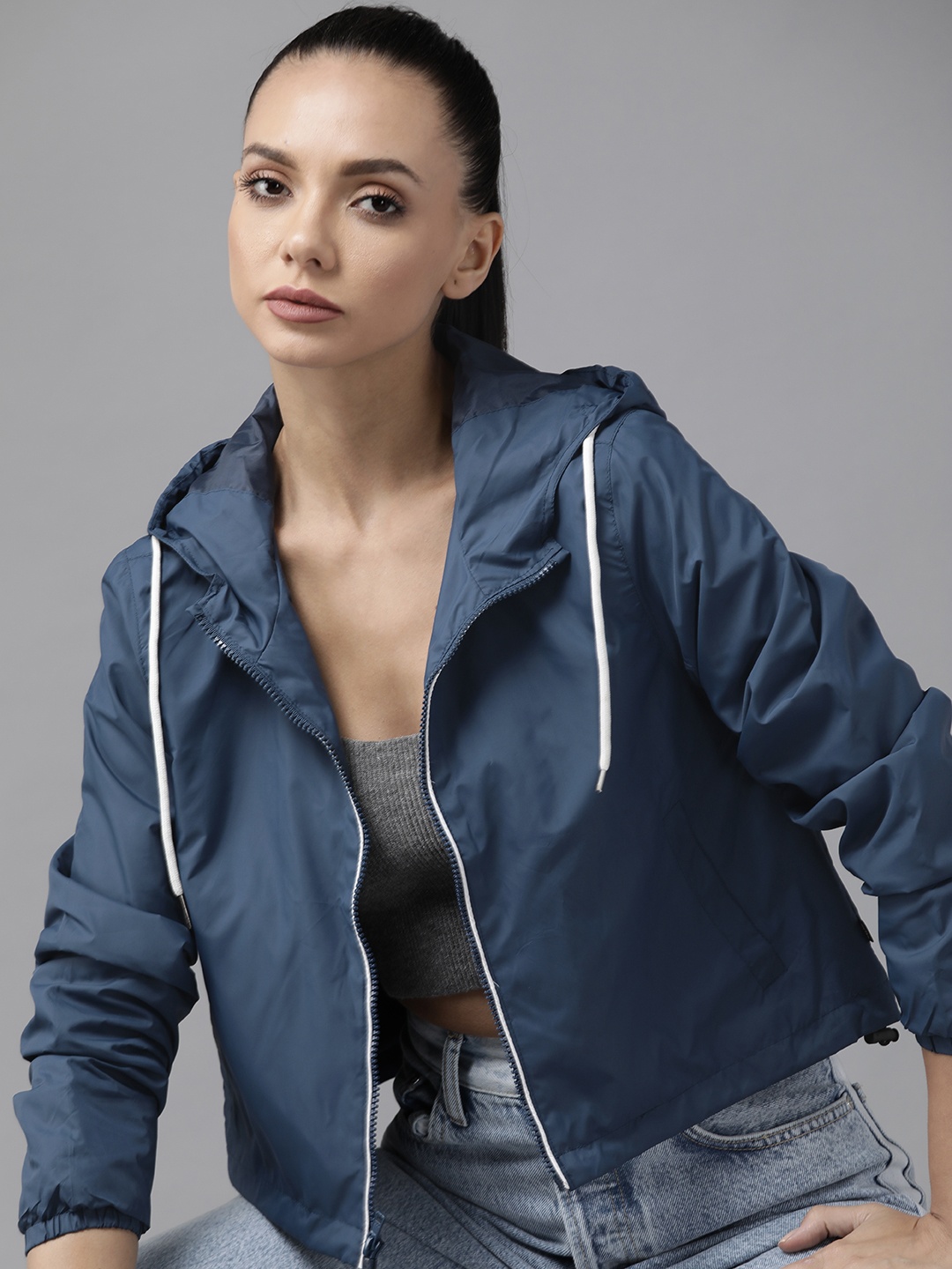 

Roadster Women Navy Blue Solid Hooded Windcheater Tailored Jacket