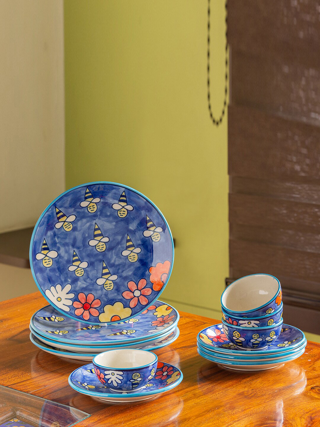 

ExclusiveLane Blue & Yellow 12 Pieces Set Hand Painted Ceramic Dinner Set