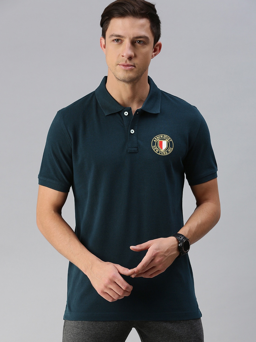 

Arrow Sport Men Navy Blue Solid Polo Collar Pure Cotton T-shirt