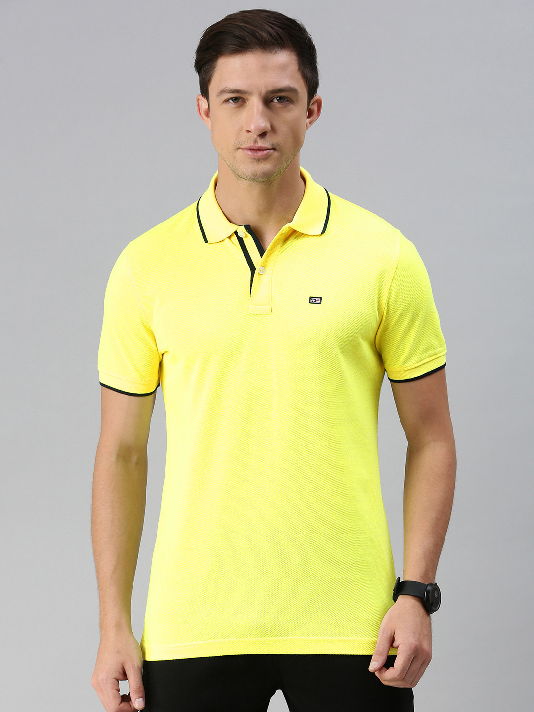 

Arrow Sport Men Yellow Self Design Polo Collar T-shirt