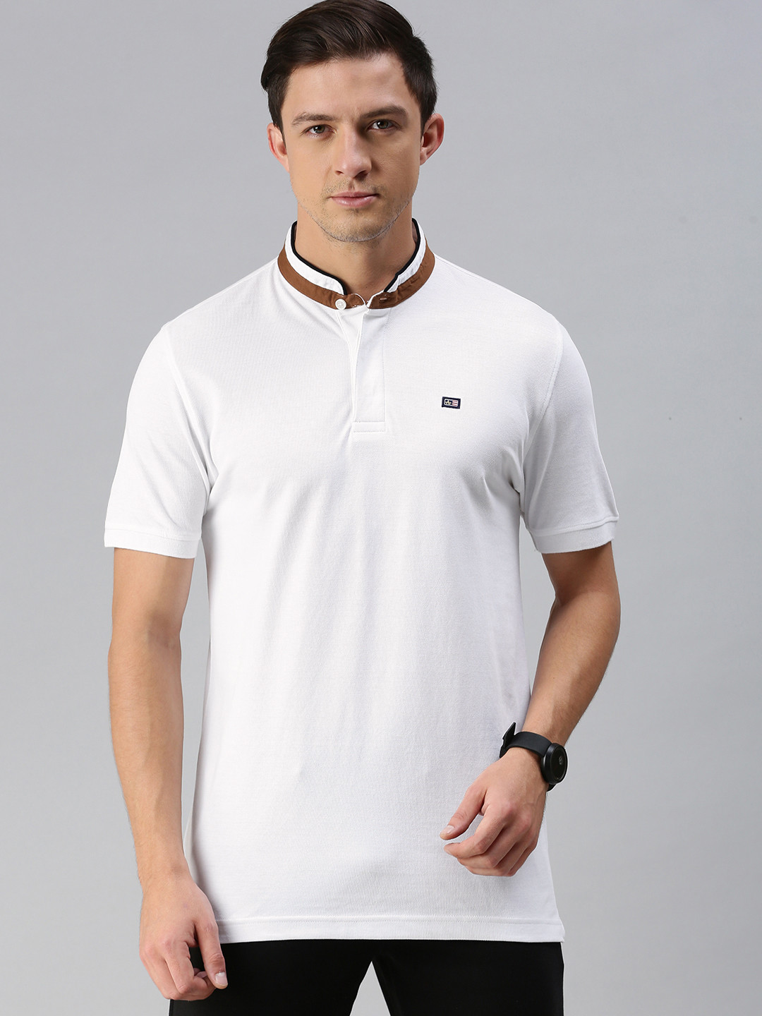 

Arrow Sport Men White Self Design Mandarin Collar Pure Cotton T-shirt